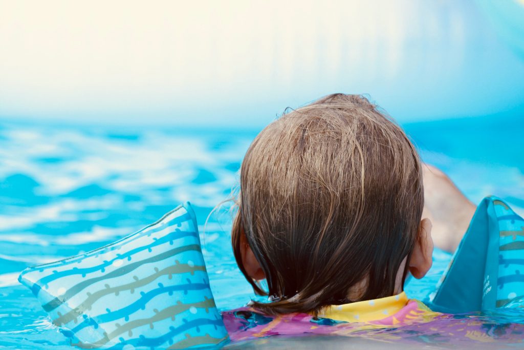 Image of a kid swimming
