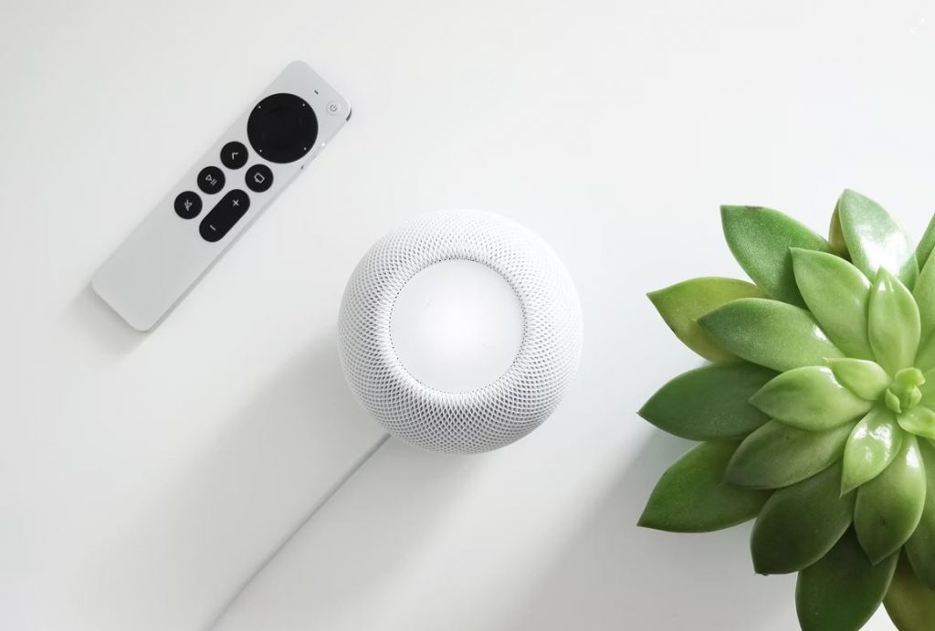 Image of remote control next to a digital assistance