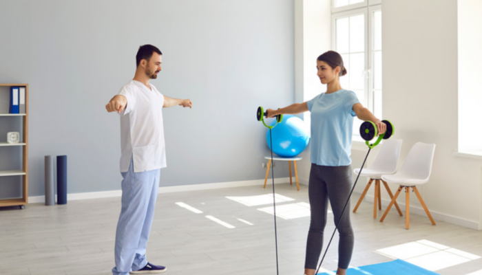 Image of a man and a woman exercising